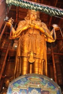 Centre piece of the Gandan temple. A 20 metre tall, 20 ton gilt statue